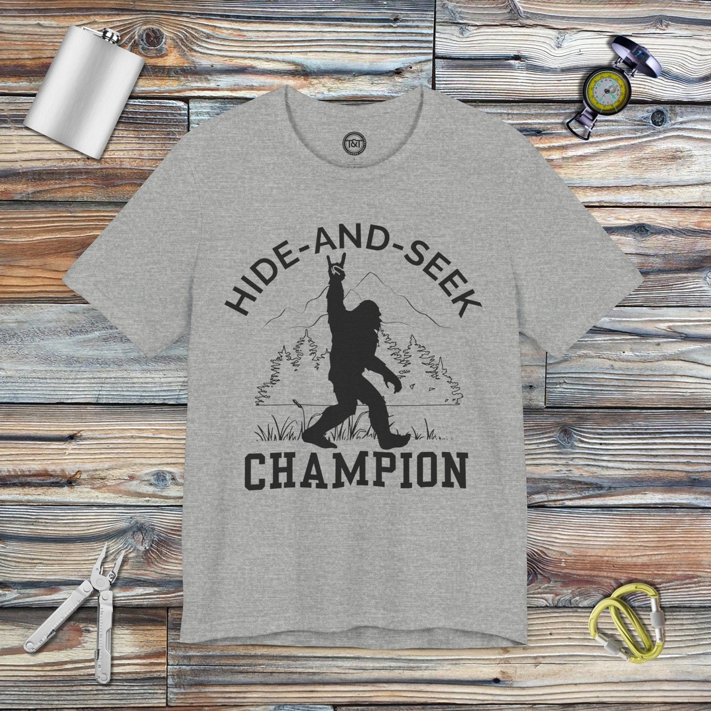 Tavern and Trail T-Shirt Hide-and-Seek Champ T-Shirt Athletic Heather / S