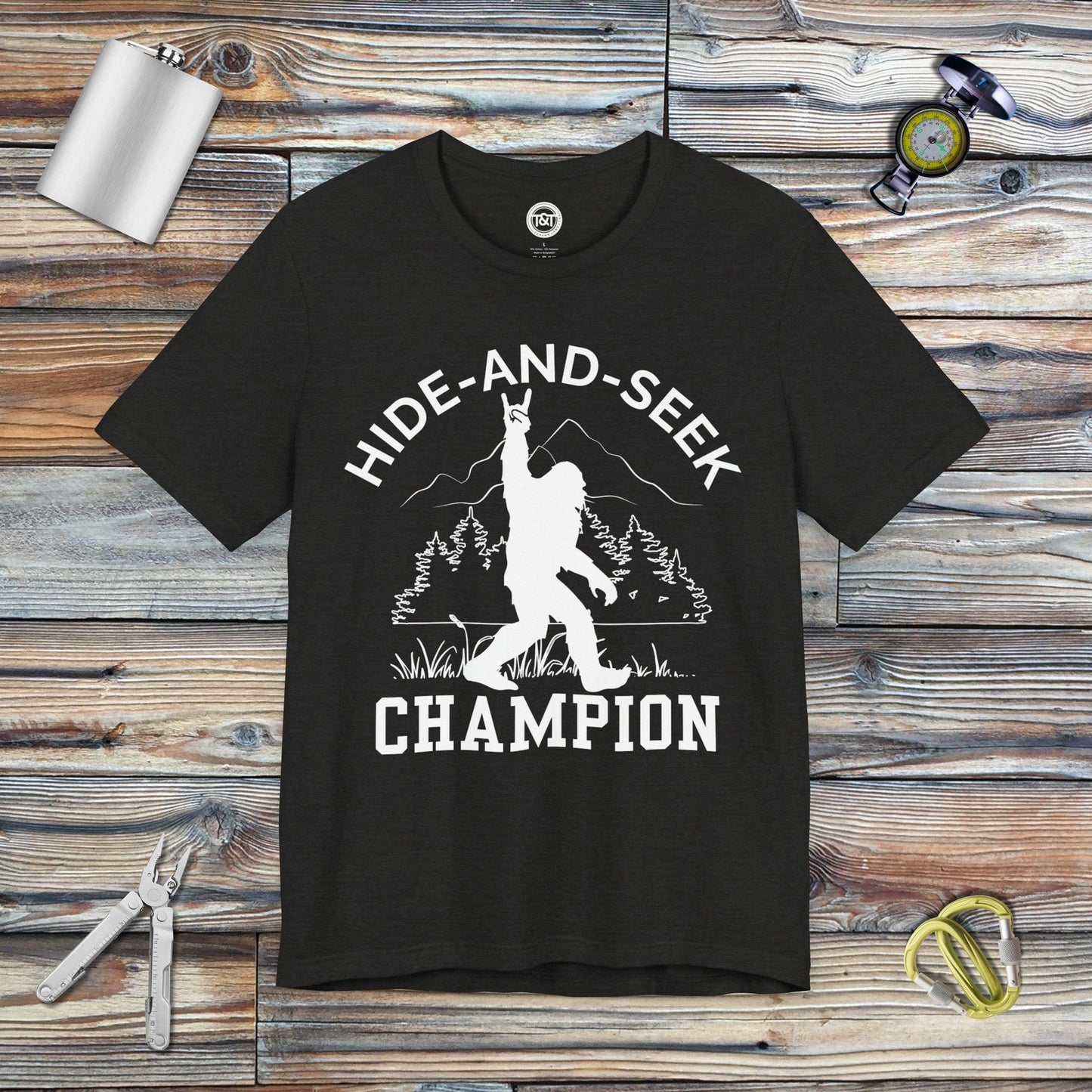 Tavern and Trail T-Shirt Hide-and-Seek Champ T-Shirt Black Heather / S