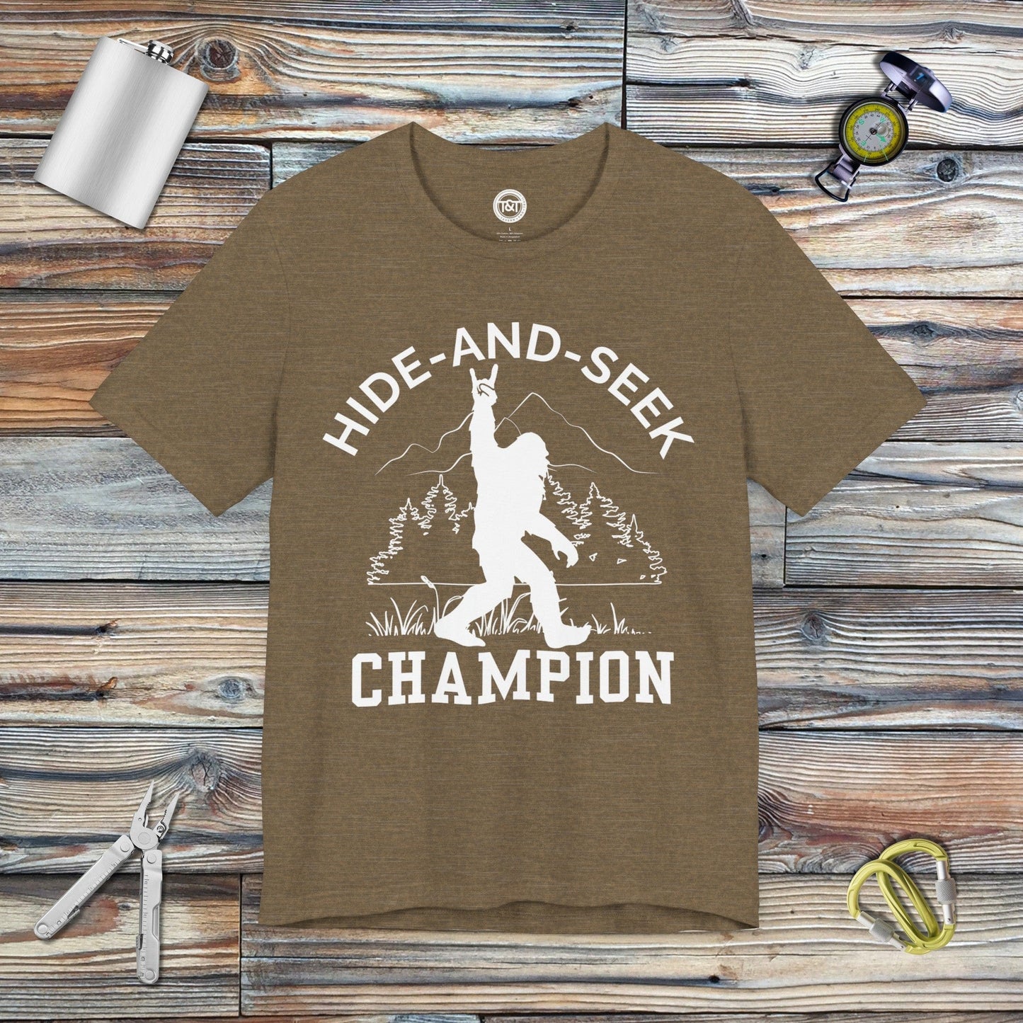 Tavern and Trail T-Shirt Hide-and-Seek Champ T-Shirt Heather Olive / S