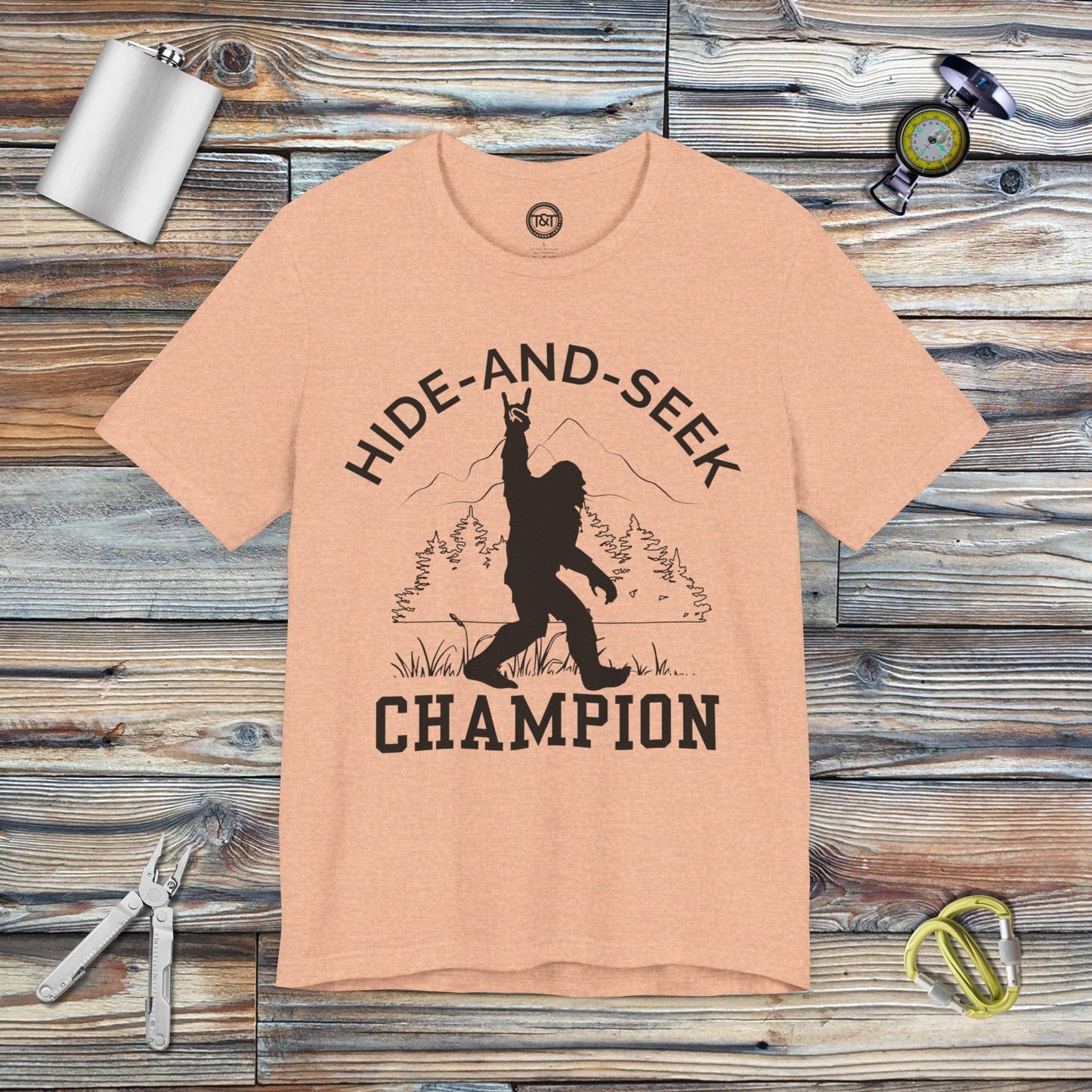 Tavern and Trail T-Shirt Hide-and-Seek Champ T-Shirt Heather Peach / S